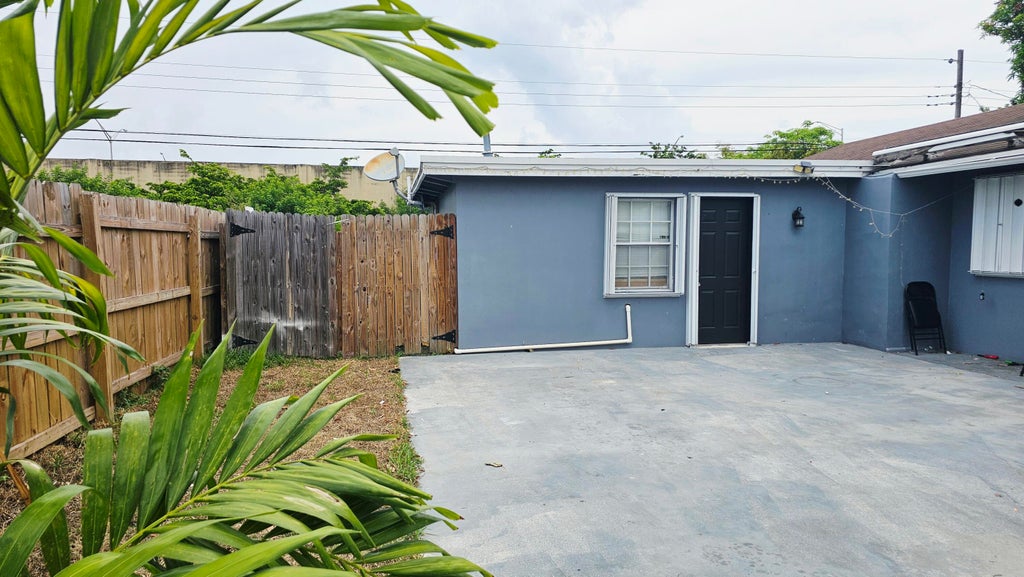 Photo of 330 N Ware Drive, West Palm Beach, FL 33409 (MLS # B26060988)