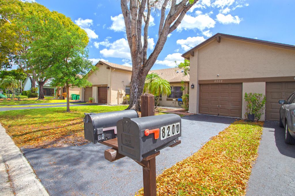 Photo of 8202 NW 100th Drive, Tamarac, FL 33321 (MLS # B26019613)