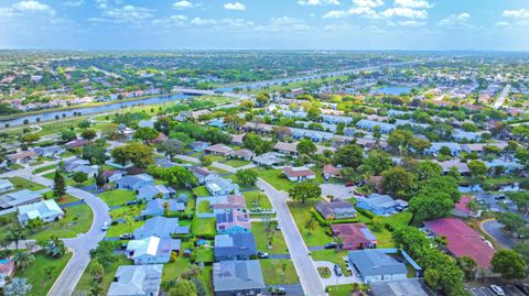 Photo of 8202 NW 100th Drive, Tamarac, FL 33321 (MLS # B26019613)