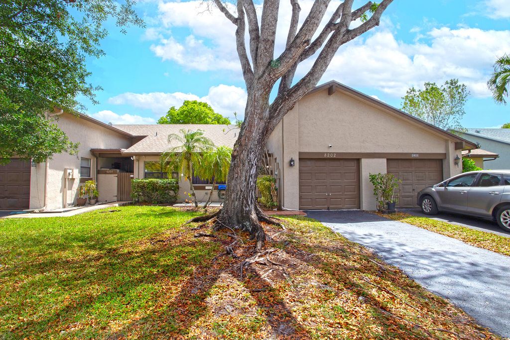 Photo of 8202 NW 100th Drive, Tamarac, FL 33321 (MLS # B26019613)