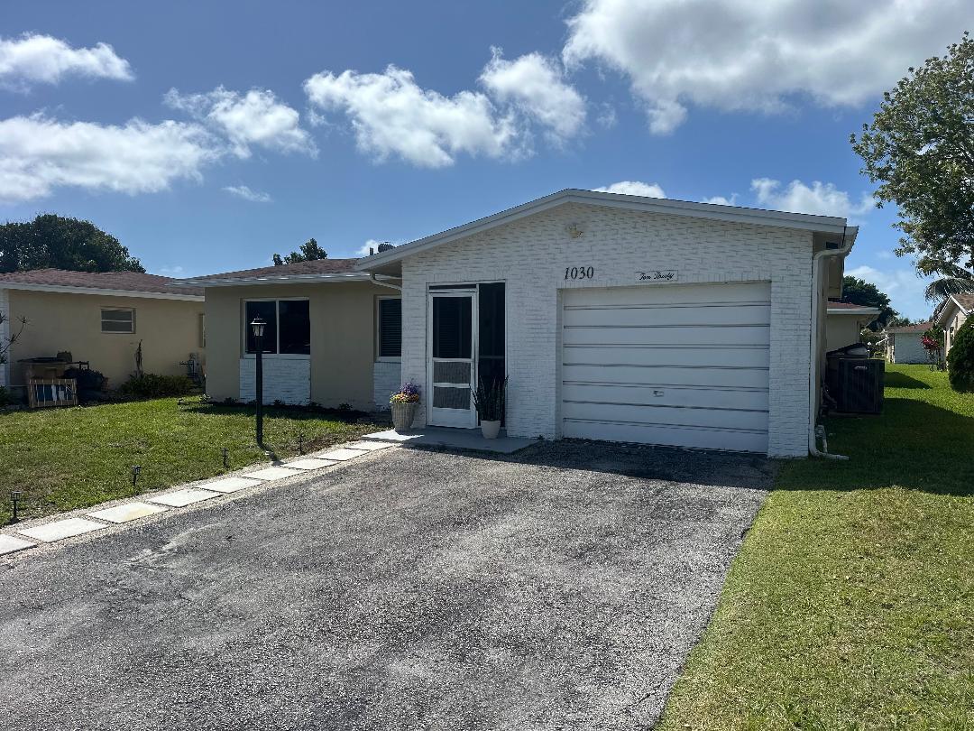 View photos, virtual tours, details... 1030 NW 49th Court