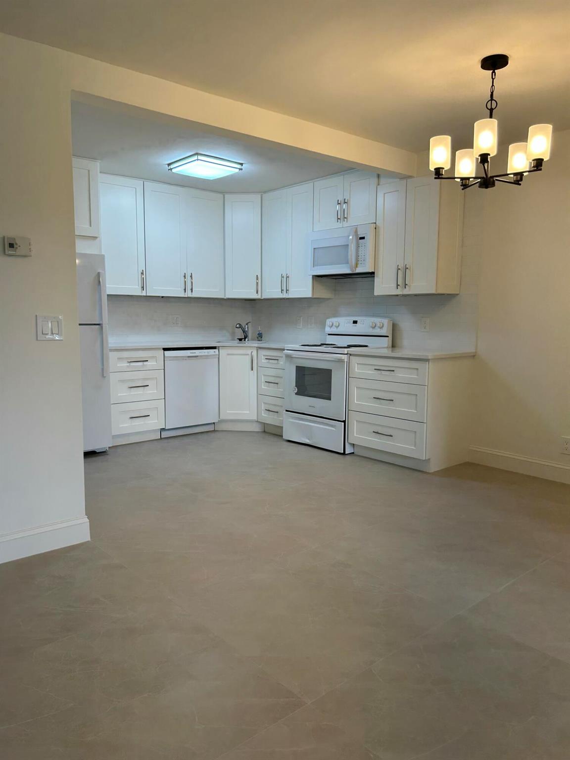 55+ Community. Beautifully renovated condo! Clean and impressive upgrades! First floor unit with parking space located in front of the residence. Quiet community that is well maintained.