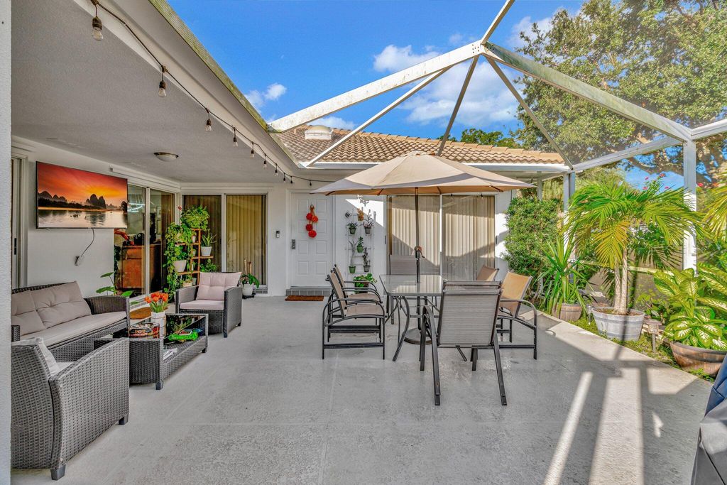 Photo of 9002 Chapman Oak Court N, Palm Beach Gardens, FL 33410 (MLS # R11023513)
