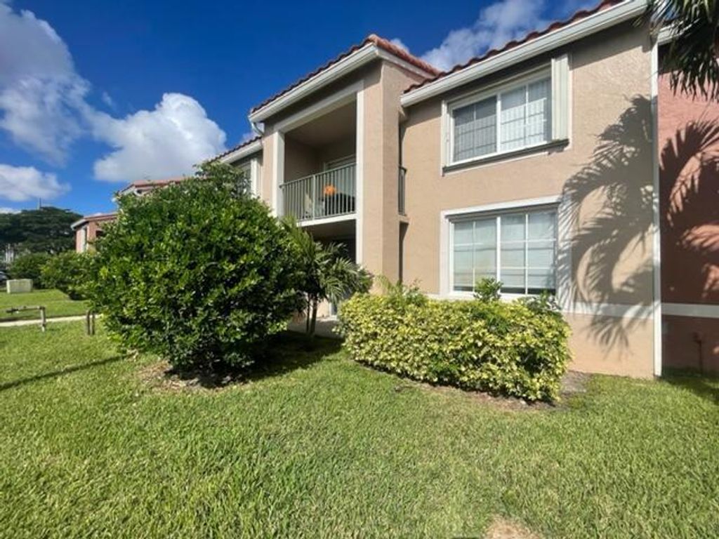 Photo of 7888 Sonoma Springs Circle #105, Lake Worth, FL 33463 (MLS # B26026586)