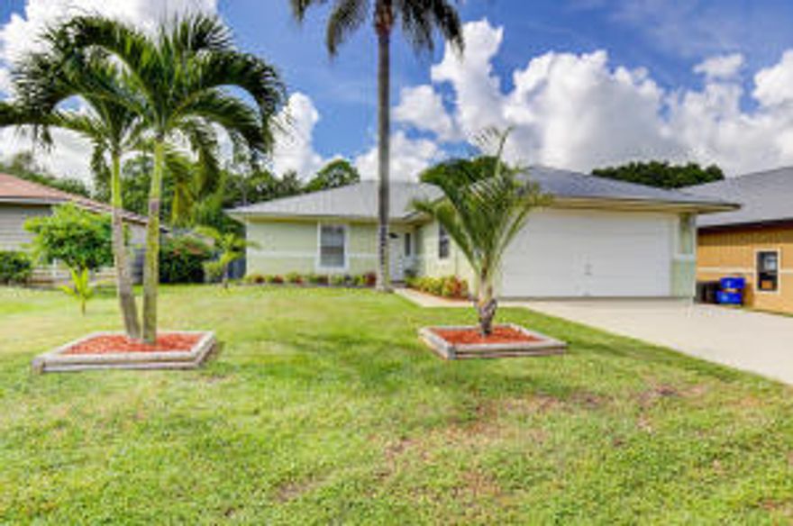 Absolutely adorable 3/2 plus 2 car garage home in a no HOA area. Granite kitchen with new back splash and newer appliances. New Washer/Dryer. New Garage Door Opener. New Water Softener. Roof replaced 2006. Newer AC. New Landscaping. New front door. New hardware on all doors. Covered screened patio with french doors. This home has been well maintained and is perfect if you are looking for a single story home with no HOA in Stuart.