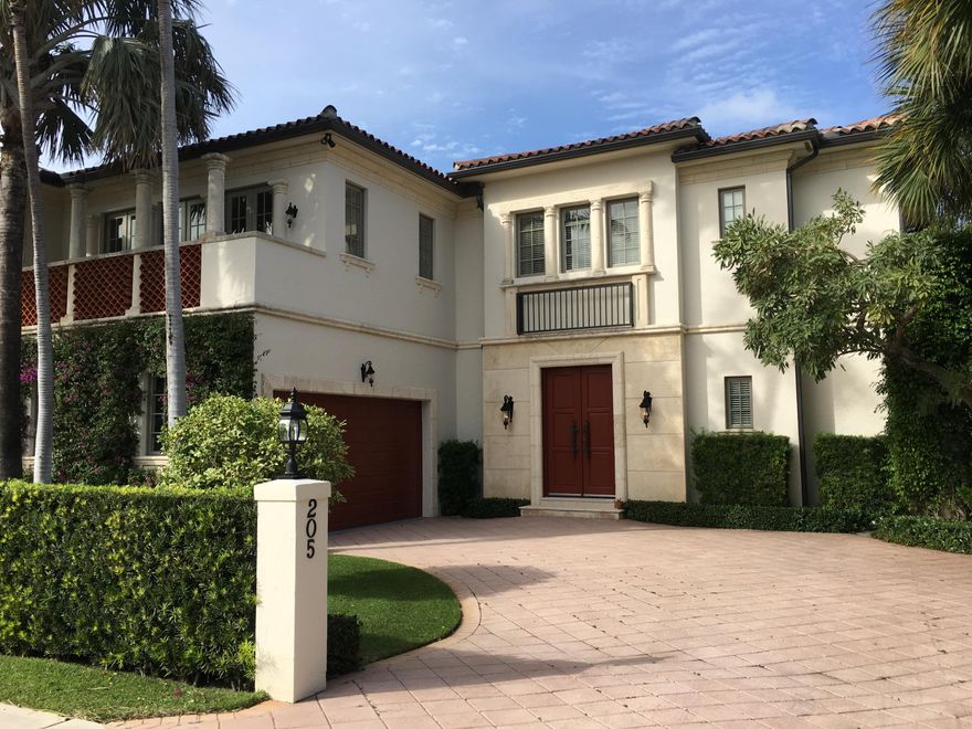 Beautiful and meticulously maintained townhouse offers 3 bedrooms, and 4.5 bathrooms and a 2-car garage. Property features include a den with wet bar, formal dining room, large chef's kitchen, Venetian plaster walls, custom built in's, crown molding, wood and cast stone flooring, high ceilings, zone HVAC, water filtration system, whole house generator and impact windows and doors. The large master suite offers two large walk in closets, his and hers bathrooms. Room for an elevator. Heated pool and entertaining areas surrounded by tropical landscaping.  A great in town location one block to the ocean.