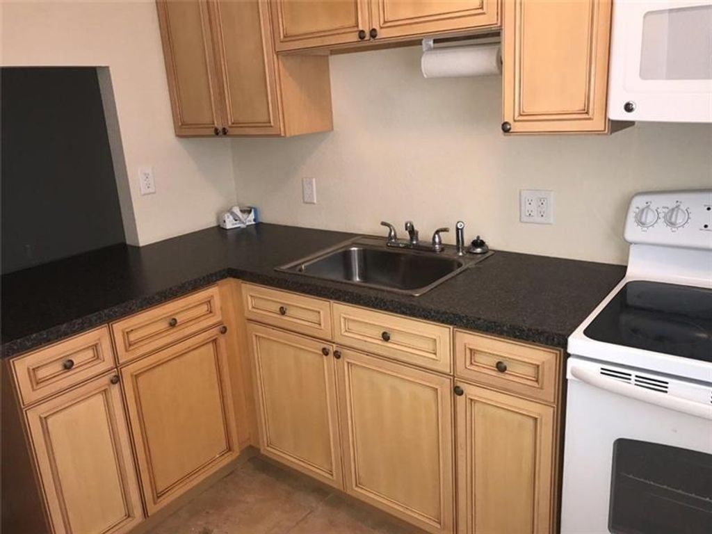 Photo of 7420 NW 85th Court #104, Tamarac, FL 33321 (MLS # F10466376)