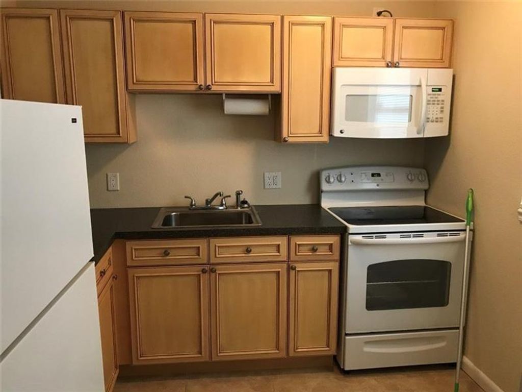 Photo of 7420 NW 85th Court #104, Tamarac, FL 33321 (MLS # F10466376)