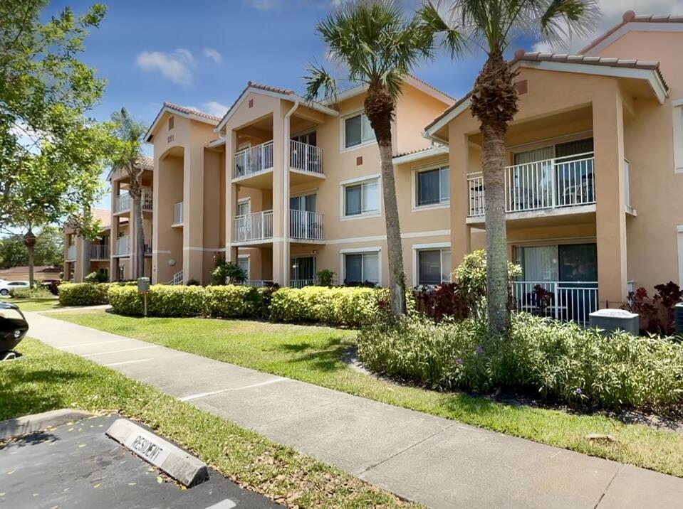 Beautiful condo unit in a great location at St Lucie West First floor with lake view. New Carpet throughout the unit. Kitchen with granite counter top, SS appliances . Washer and Dryer in unit. Extra storage outside unit. The Club is located in the heart of Saint Lucie West. Walking distance to restaurants, Publix and shopping center. Gated community with Clubhouse, pool, fitness center, picnic area and child playground. Must to see!!!!. Unit is vacant and very easy to show.