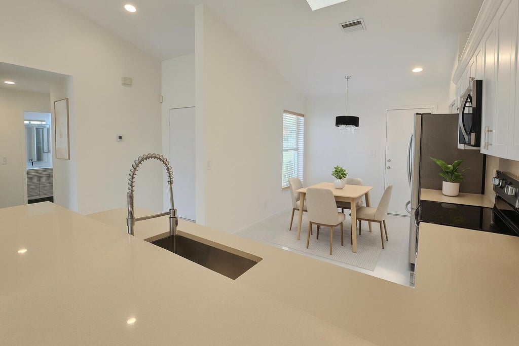 Photo of 5622 Royal Lake Circle, Boynton Beach, FL 33437 (MLS # R11119866)
