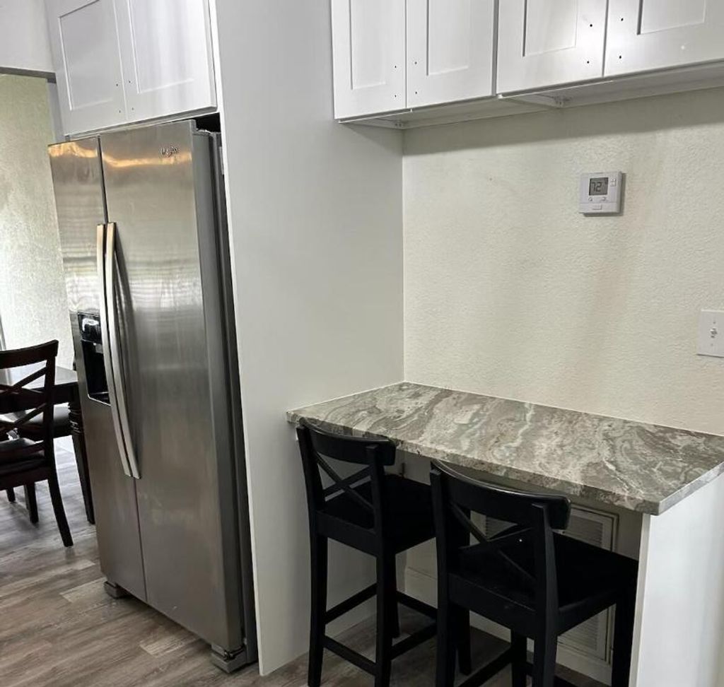 Photo of 2871 NE Savannah Road, Jensen Beach, FL 34957 (MLS # R10955442)