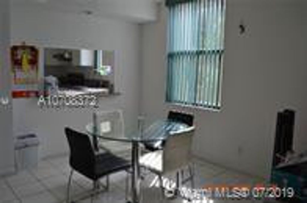 Photo of 8429 Forest Hills Drive #201, Coral Springs, FL 33065 (MLS # B26009604)