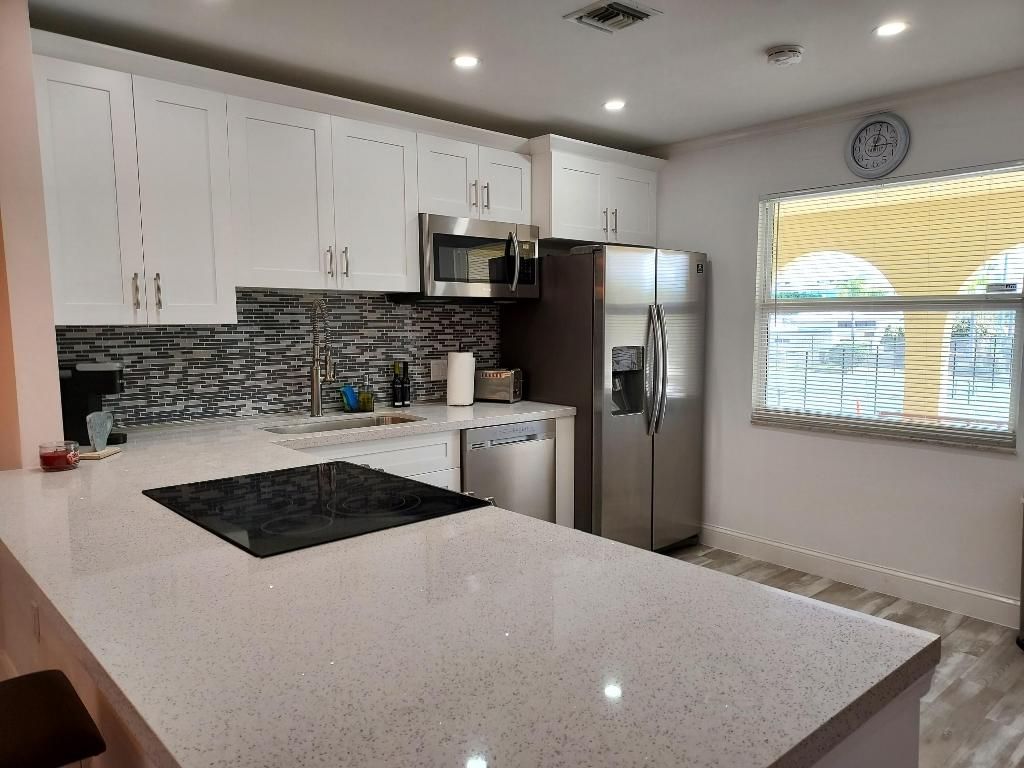 Photo of 717 S Us Highway 1 #111, Jupiter, FL 33477 (MLS # R10986705)