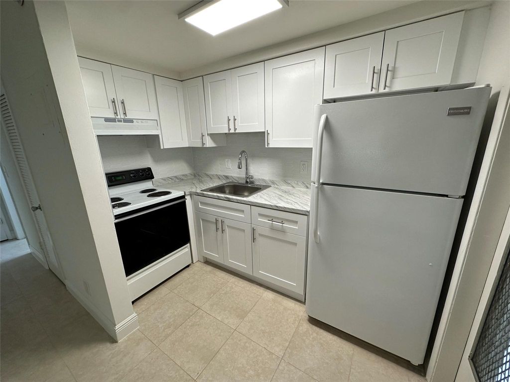 Photo of 1855 Adams Street #5, Hollywood, FL 33020 (MLS # F10398065)