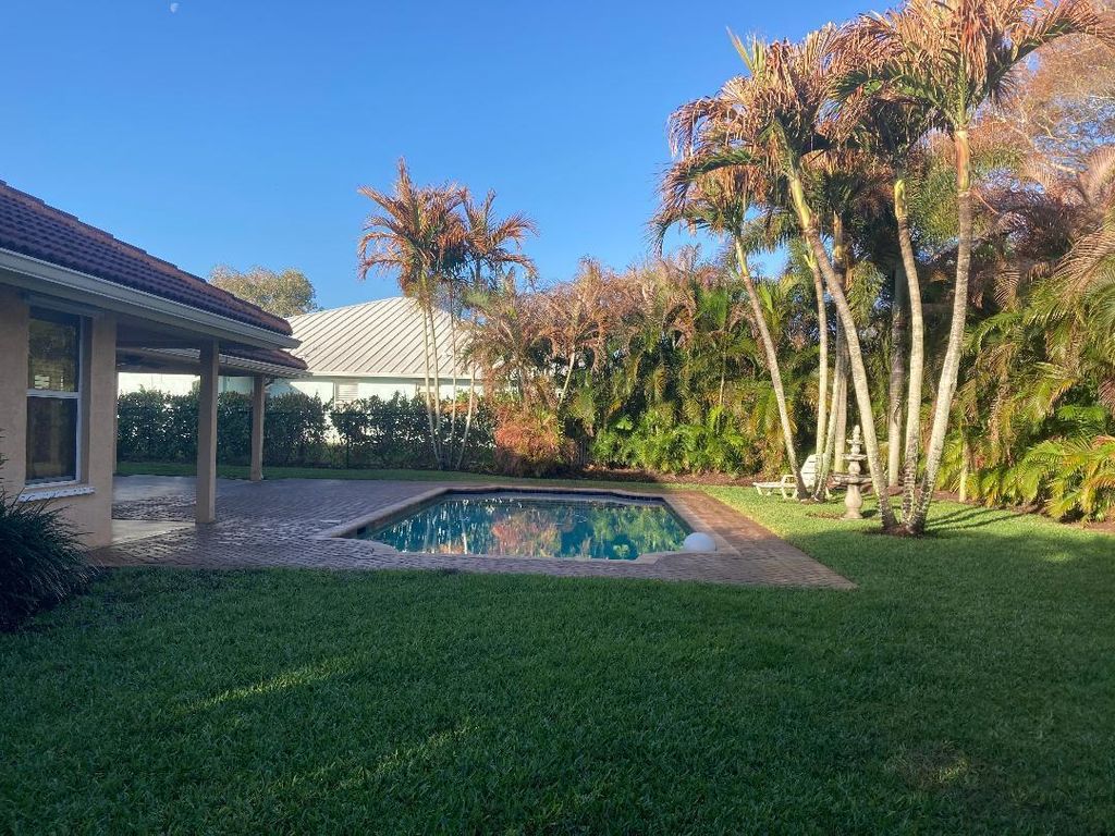 Photo of 8437 SE Woodcrest Place, Hobe Sound, FL 33455 (MLS # R11165355)