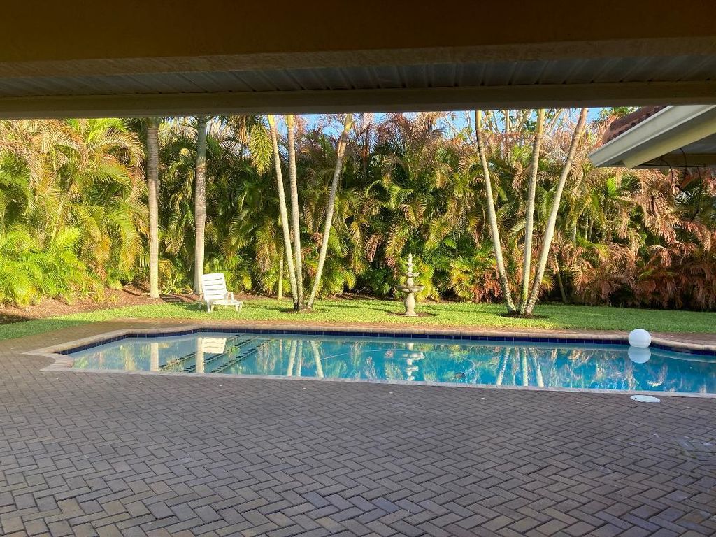 Photo of 8437 SE Woodcrest Place, Hobe Sound, FL 33455 (MLS # R11165355)