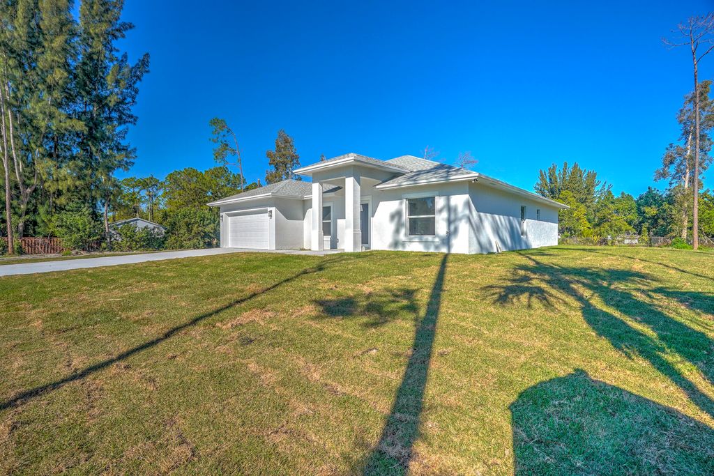 Photo of 13875 63rd Lane N, The Acreage, FL 33470 (MLS # R11150708)