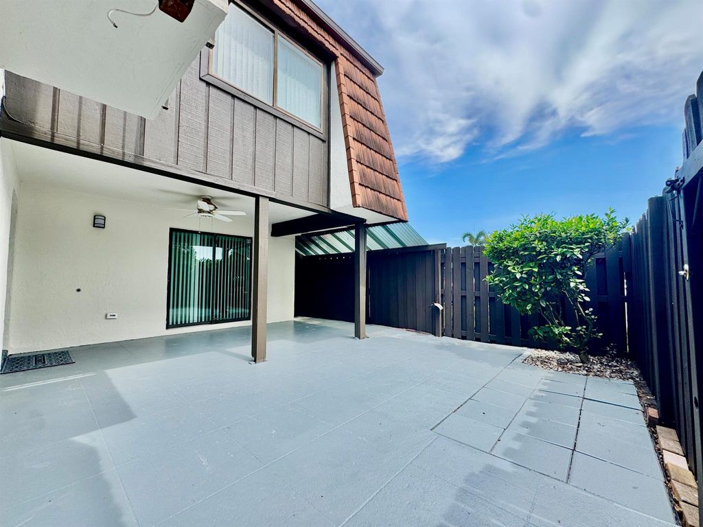 Photo of 6330 Red Pine D Lane #D, Greenacres, FL 33415 (MLS # R11105803)