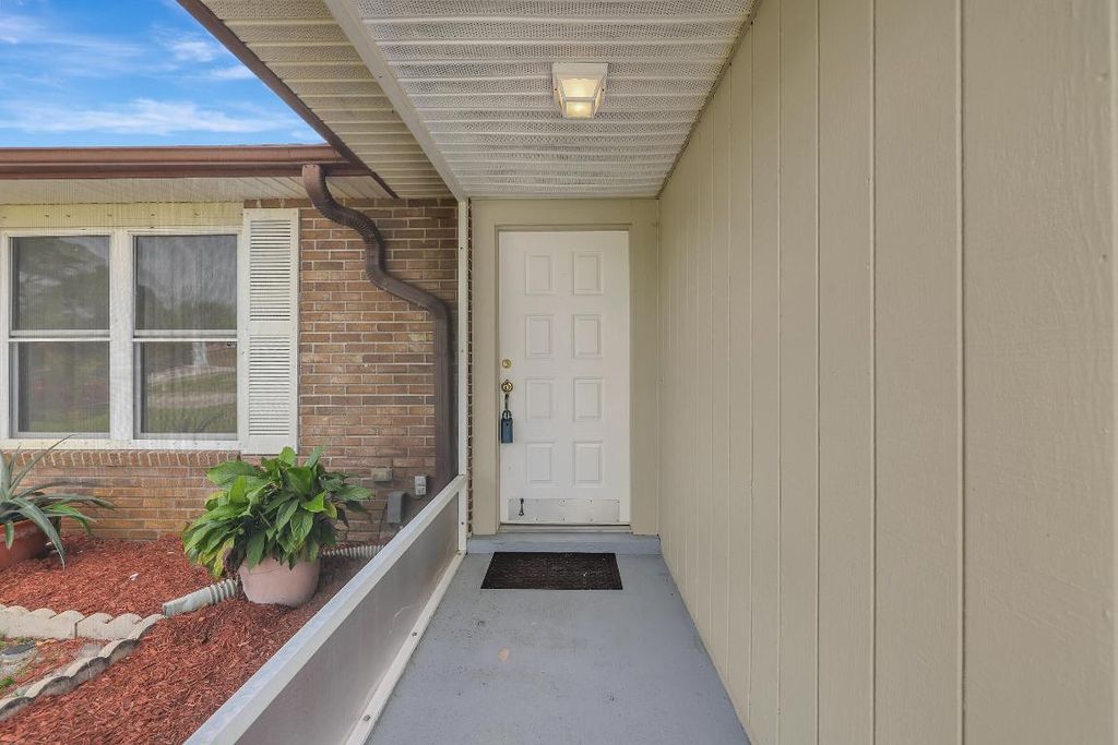 Photo of 1242 SW Aragon Avenue, Port Saint Lucie, FL 34953 (MLS # R10960014)