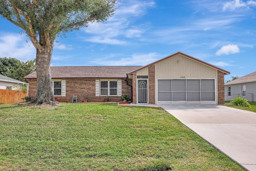 Photo of 1242 SW Aragon Avenue, Port Saint Lucie, FL 34953 (MLS # R10960014)