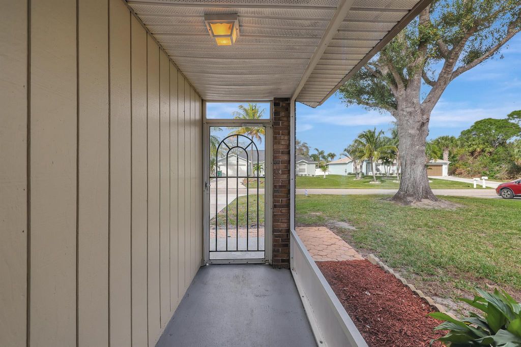 Photo of 1242 SW Aragon Avenue, Port Saint Lucie, FL 34953 (MLS # R10960014)