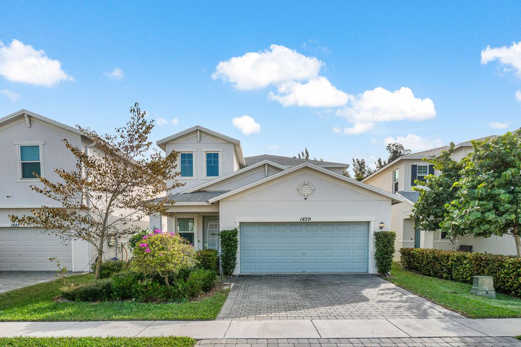 Photo of 1829 Lake Cove Drive, Lake Worth Beach, FL 33460 (MLS # R11051814)