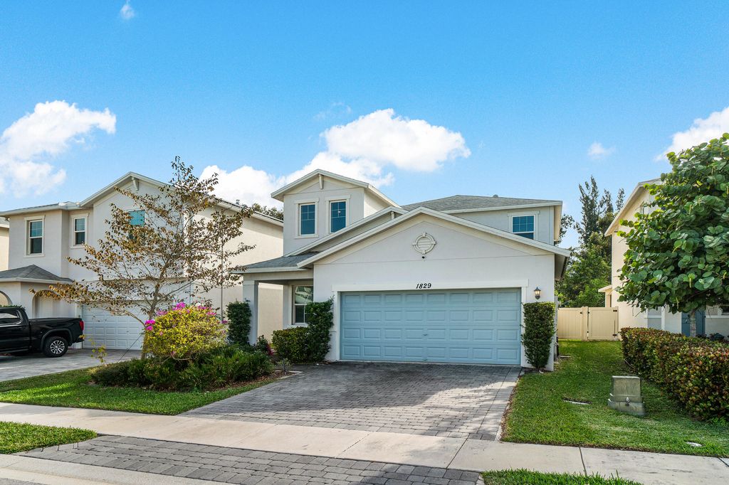 Photo of 1829 Lake Cove Drive, Lake Worth Beach, FL 33460 (MLS # R11051814)