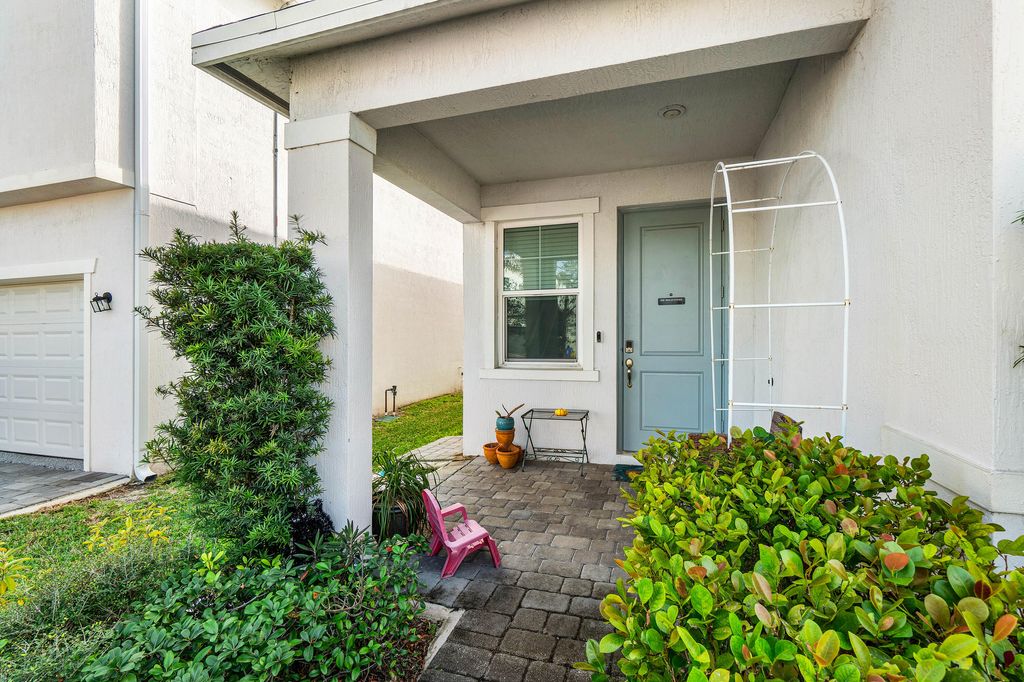 Photo of 1829 Lake Cove Drive, Lake Worth Beach, FL 33460 (MLS # R11051814)