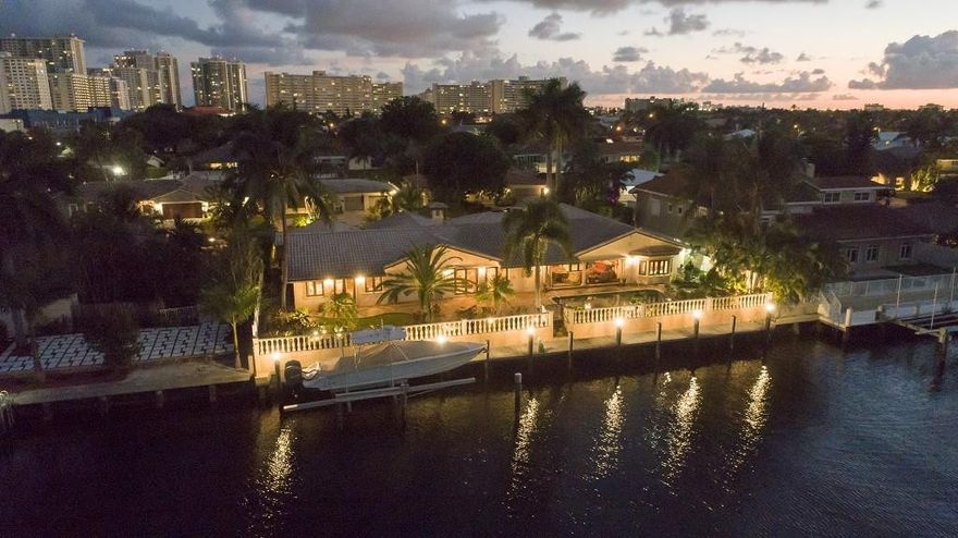 Original Price: $1.995 Million. Reduced to $1.849 Million. One Level Five BR Home. Oversized 120x100 Lot. 120 Ft Seawall Fits 100+ Ft Yacht. Wide (115 Ft) Canal. Re-Built Circa 2004 & More Recent Renovations. Eurotech Impact Glass. Propane Generator. Covered Lanai: Slate Floors, Gas Grill, Wet Bar. Media Room: Built-In Cabinetry, Large Screen TV, Bamboo Floors. Pebble-Tec Salt Water Pool. Slate Patio. Trex Composite Dock. 15,000 Lb Boat Lift. Marble Floors in Living Areas. 4 Bedroom Wing: Separate Living Area & Fireplace. Spray Foam Icynene Insulation. Master Suite: Separate Gym/Office, Marble Floors. Master Bath: Spa Tub, Steam Shower, Water Closet with Bidet. Kitchen: Cherry Wood Cabinetry, Granite Tops & Island with Sink. Induction Top Cooktop, Stainless Steel Ovens, Sub Zero Fridge.
