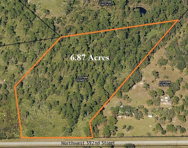 The Pinelands- 6.87 acres lined with mature tall Pines that give wooded privacy. Ideal to build your dream home in the country or come out for weekend camping retreats under the starry skies. Conveniently located off 441 North. Ideal for Vero Beach. St. Lucie County, or Okeechobee County commuters! Near SR 68 (Orange Avenue) and SR 60. This is a Non HOA community, located off paved road. Nearby power lines for electrical access. This property is a Diamond in the Rough! Don't miss out on your opportunity to own affordable acreage! Offered at $80,000.