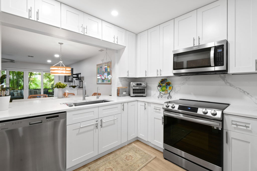 Photo of 1222 Ocean Dunes Circle, Jupiter, FL 33477 (MLS # R11069751)