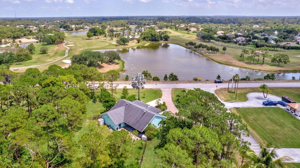 Photo of 12061 Citrus Grove Boulevard, West Palm Beach, FL 33412 (MLS # R11084634)