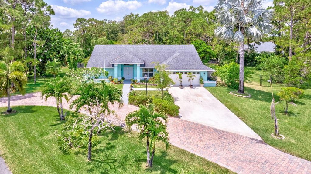 Photo of 12061 Citrus Grove Boulevard, West Palm Beach, FL 33412 (MLS # R11084634)