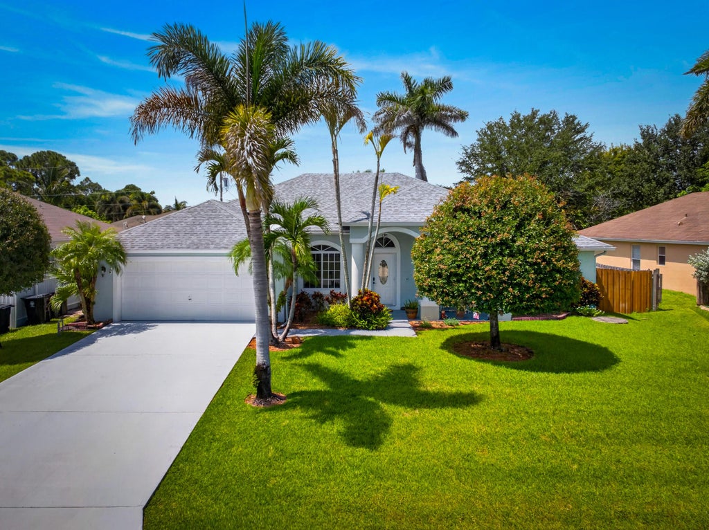 Photo of 3274 SW CRUMPACKER Street, Port Saint Lucie, FL 34953 (MLS # B26075463)