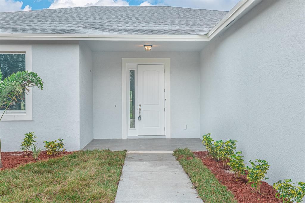 Photo of 450 SW Paar Drive, Port Saint Lucie, FL 34953 (MLS # R10681954)