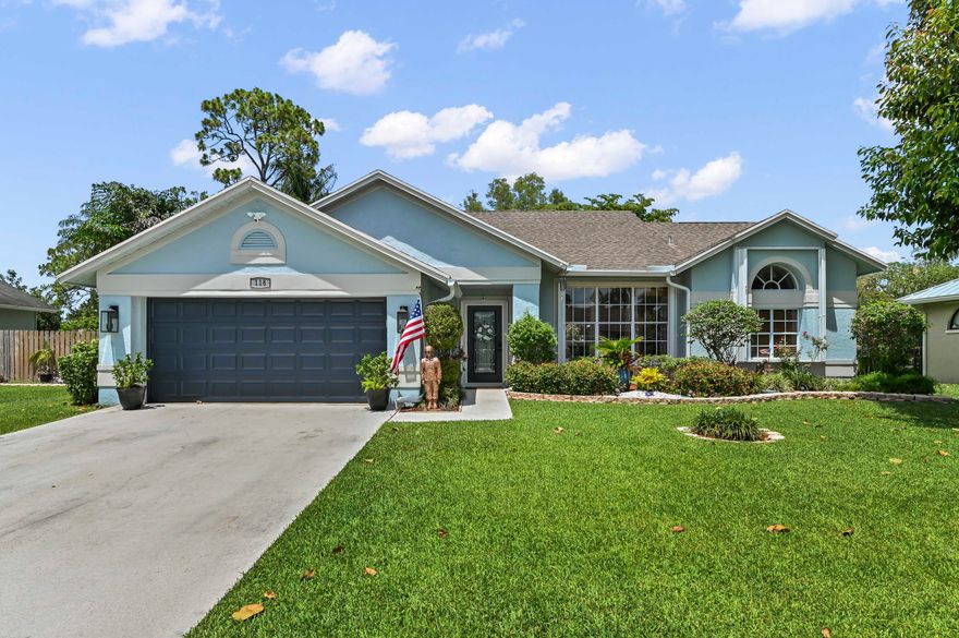 Welcome to a beautifully maintained single-story home nestled in the heart of Royal Palm Beach. Situated on a non-HOA community with an oversized quarter-acre lot, this inviting 3-bedroom, 2-bath residence offers the perfect blend of comfort, functionality, and Florida charm. From the moment you step inside, you're greeted by bright, open living spaces, soaring natural light, and a seamless flow designed for both everyday living and entertaining. The thoughtfully designed layout features spacious living and dining areas, a beautifully-appointed custom kitchen with quartzite countertops, ample cabinetry and large workspaces, and generously sized bedrooms that provide comfort and privacy. The primary suite serves as a relaxing retreat with an fully updated ensuite bath and tranquil views. The home's airy feel, inviting indoor-outdoor connection, and versatile spaces perfect for hosting guests, working from home, or simply enjoying peaceful family living.  Step outside to discover a large backyard with endless potential — ideal for creating your dream outdoor oasis, adding a pool, or enjoying weekend gatherings under the South Florida sun. Located in a quiet, established neighborhood with no HOA, this property offers convenient access to top-rated schools, parks, shopping, dining, and major commuter routes. A rare opportunity to own a charming home with space, privacy, and exceptional value in one of Royal Palm Beach's most desirable communities.