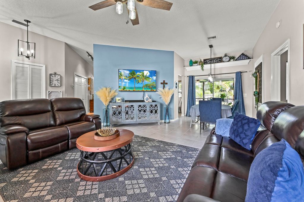 Photo of 118 Royal Pine Circle N, Royal Palm Beach, FL 33411 (MLS # B26025616)