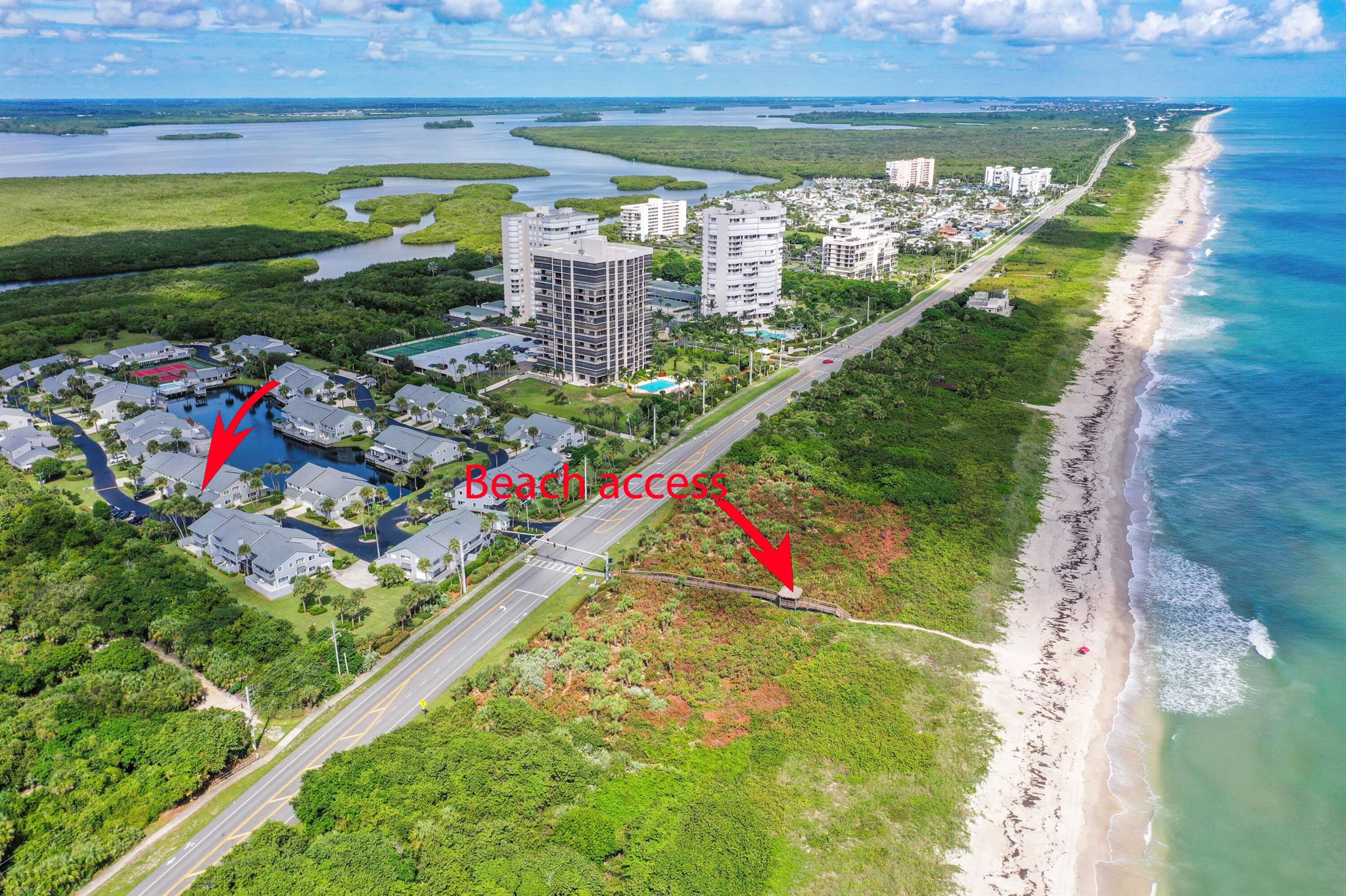 This completely renovated property is loaded with great amenities, and offers a walking path bringing you to the beach in just 2 minutes. Walk through the door and you'll love the wall-to-wall plank tile flooring. Orange peel ceilings, crown molding, loads of natural light pouring in from the enclosed waterfront patio, and stunning views the second you step out back. The kitchen boasts a contemporary tile backsplash, soft-close cabinets and drawers, a stainless steel appliance package, and jaw-dropping quartz countertops. The upper level bedrooms enjoy a sense of privacy, and the uniquely beautiful bamboo flooring is a show stopper. Just wait until you see the master bathroom. Dual sinks, matching quartz vanity, and a modern shower tiled floor-to-ceiling with a custom seating area. The