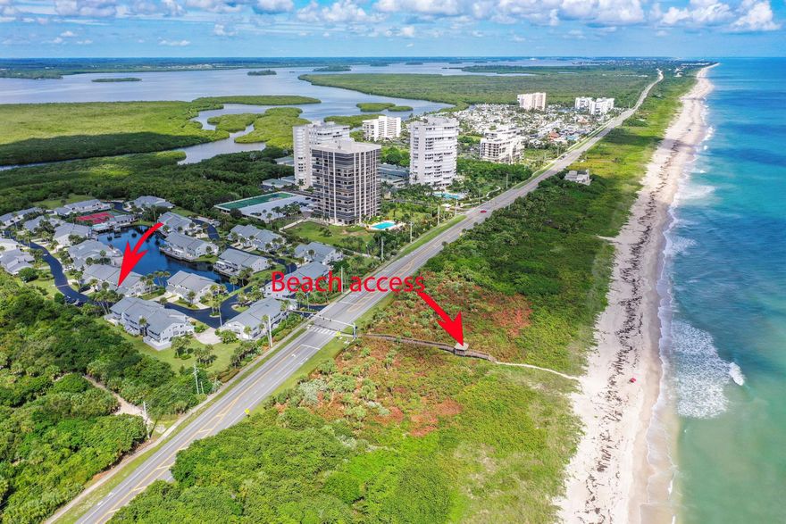 This completely renovated property is loaded with great amenities, and offers a walking path bringing you to the beach in just 2 minutes. Walk through the door and you'll love the wall-to-wall plank tile flooring. Orange peel ceilings, crown molding, loads of natural light pouring in from the enclosed waterfront patio, and stunning views the second you step out back. The kitchen boasts a contemporary tile backsplash, soft-close cabinets and drawers, a stainless steel appliance package, and jaw-dropping quartz countertops. The upper level bedrooms enjoy a sense of privacy, and the uniquely beautiful bamboo flooring is a show stopper. Just wait until you see the master bathroom. Dual sinks, matching quartz vanity, and a modern shower tiled floor-to-ceiling with a custom seating area. The