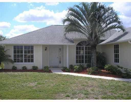 Photo of 2680 SW Opechee Avenue, Port Saint Lucie, FL 34987 (MLS # R10739614)