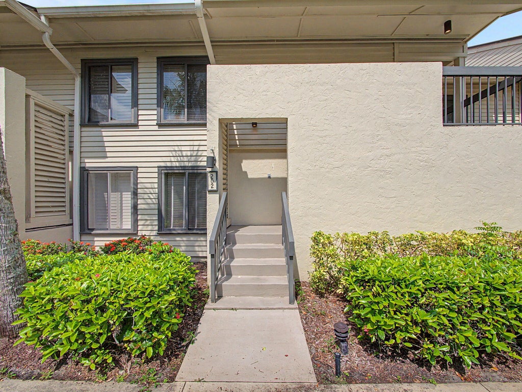 Photo of 5132 SE CLUB Way #202, Stuart, FL 34997 (MLS # B26059759)
