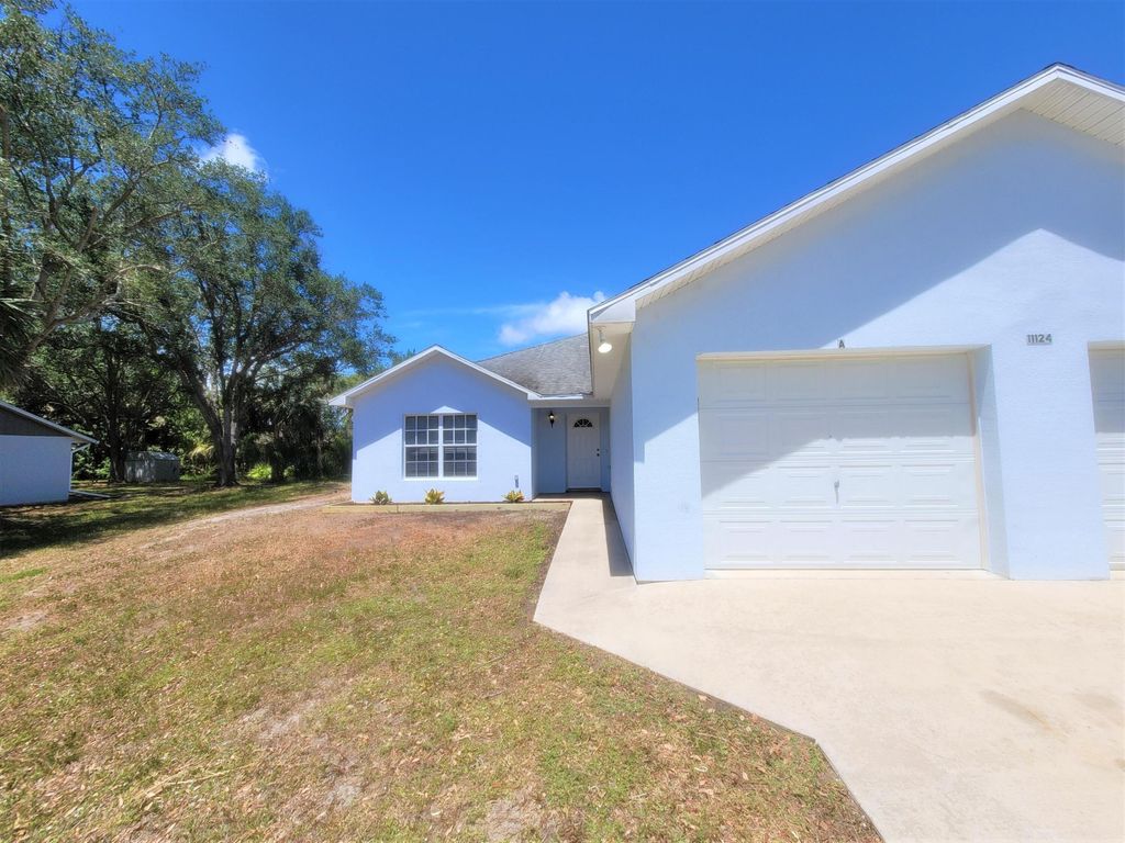Photo of 11124 Hotchkiss Drive #A, Sebastian, FL 32958 (MLS # B26001680)