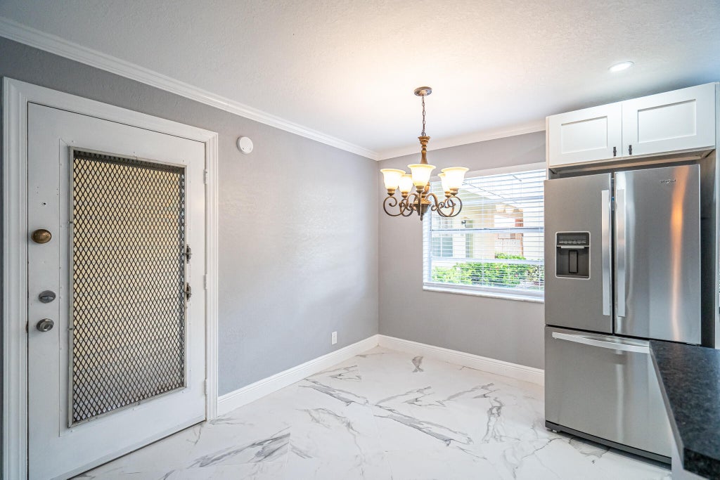 Photo of 244 Normandy F Lane, Delray Beach, FL 33484 (MLS # B26037444)