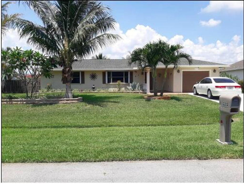 Photo of 2212 SE Aneci Street, Port Saint Lucie, FL 34984 (MLS # R10800675)