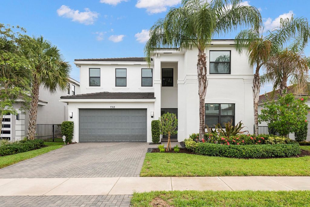 Photo of 7313 Stella Ln, Lake Worth, FL 33463 (MLS # F10538434)