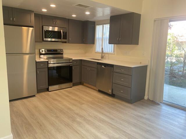 This beautiful 2 bedroom/1.5 bath two-story townhome in Lauderhill features a recently installed stainless steel kitchen appliances and floor planks. Clean cabinets, walk-in closet, and a mini patio great for BBQ nights. Washer and dryer included. Small pets are okay. Property has one assigned parking space and HOA application may take up to 7 business days to process. Schedule your tour today and make this charming townhome yours!We're pleased to offer you the option to qualify for a deposit-free move-in with Obligo. This simple and fast process could save you the hassle and upfront cost of a traditional cash deposit.