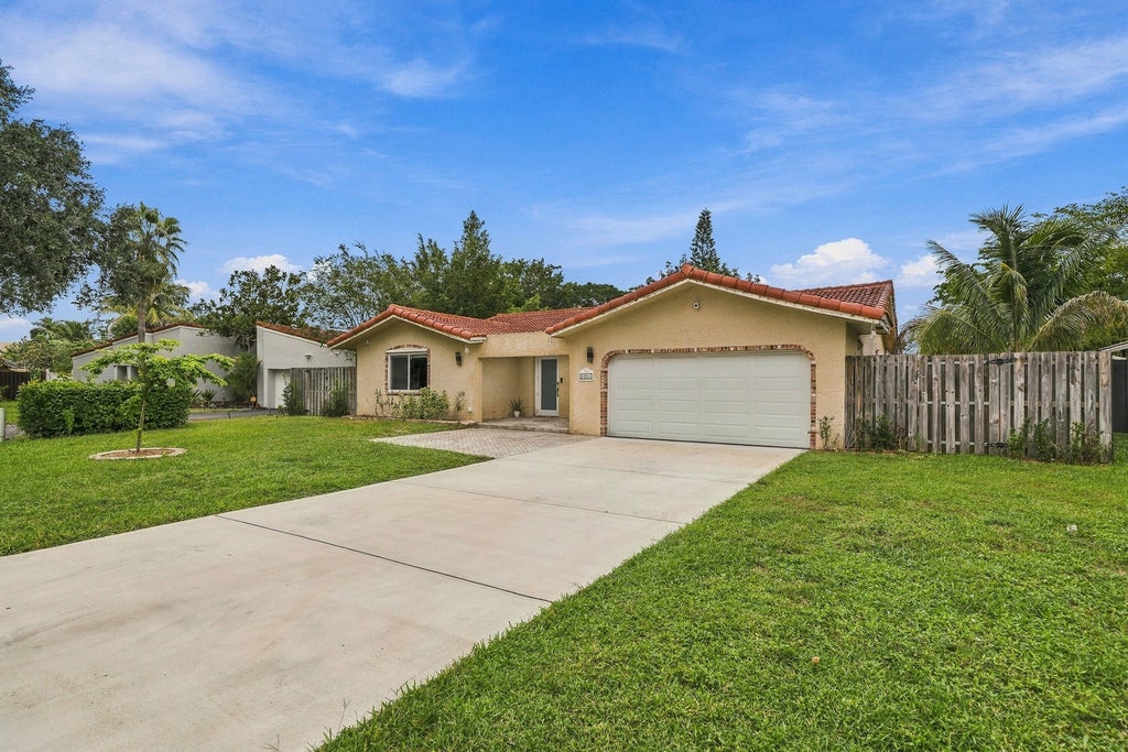 Photo of 9041 NW 27TH Place, Coral Springs, FL 33065 (MLS # B26092195)