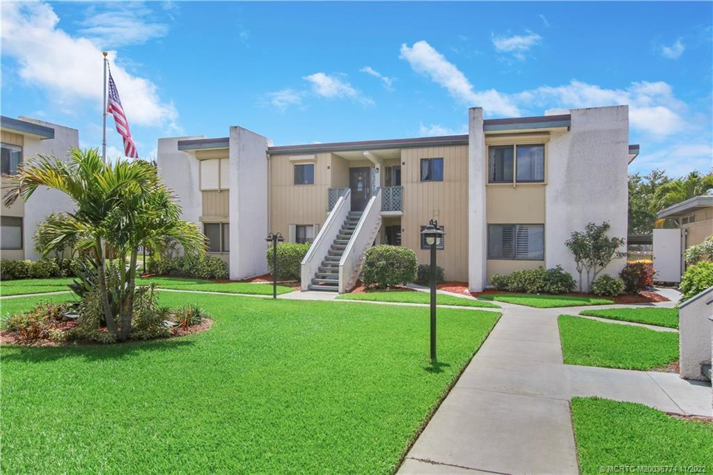 AVAIL ANNUALLY AT $1575 PER MONTH. SEASONAL MONTHS (OCT- APRIL) $2,850 PER MONTH. OFF SEASON MONTHS (MAY- SEPT) $1575 PER MONTH. Quaint 2 bedroom 2 bathroom SECOND FLOOR condo in the desirable 55 PLUS COMMUNITY located in Beacon 21 in Jensen Beach. Feel safe and secure on the second floor! Short distance the beach and downtown Jensen. Spacious living area looks out to enclosed patio for extra living space. Laminate wood flooring throughout with tile in the kitchen and bathrooms as well as the enclosed patio. Oversized master and guest rooms both with walk-in closets. Put in your own design touches and upgrades and make this home your perfect beach getaway. Covered parking (#10). Great community amenities including private marina, pier for fishing, boat slips (upon availability), pool,