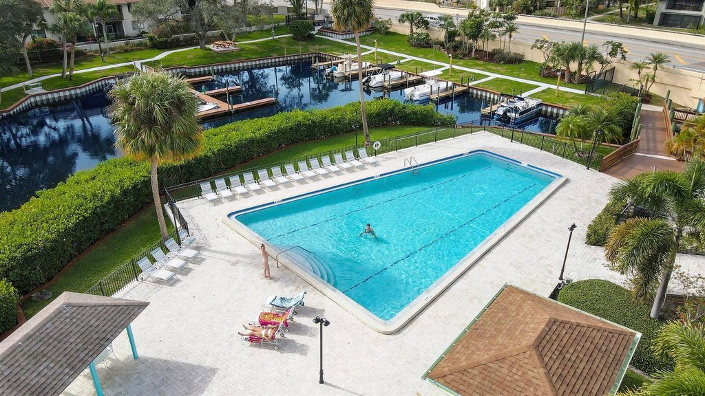 Photo of 1501 NE 13th Terrace #10, Jensen Beach, FL 34957 (MLS # R11048378)