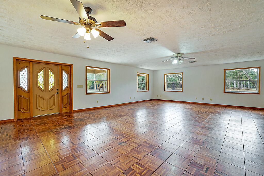 Photo of 3680 Learwood Drive, Loxahatchee, FL 33470 (MLS # R11169395)